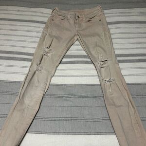 Distressed Beige Skinny Jeans